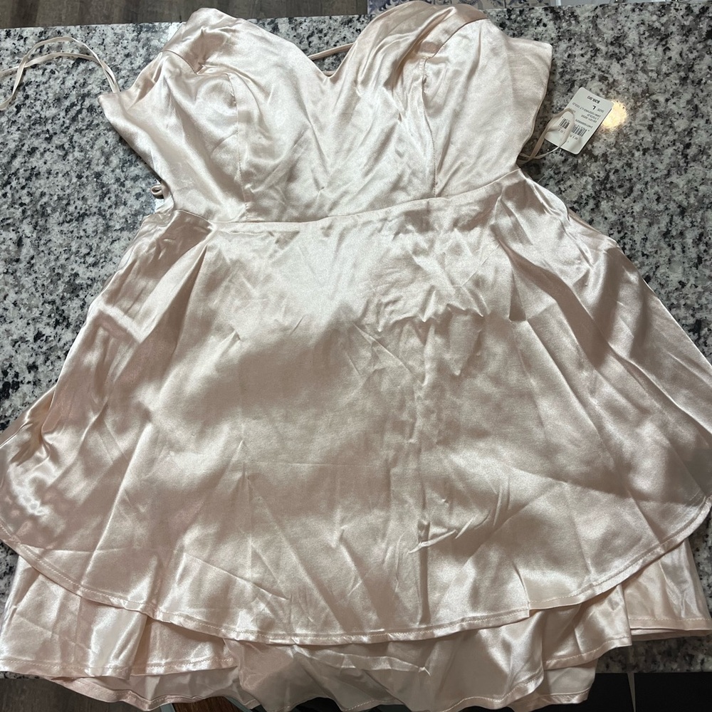Windsor homecoming dress. Sleeveless satin tiered skater dress.